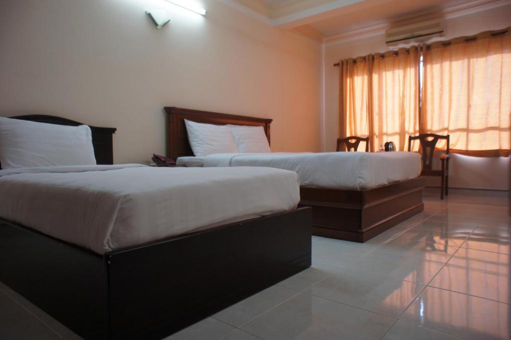 Elegant Inn Hô Chi Minh-Ville Chambre photo